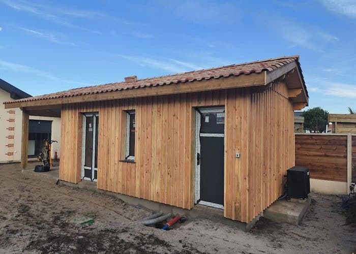 Création d'une extension en bois de 60m2 avec charpente bois couverture tuiles et menuiserie en aluminium 1