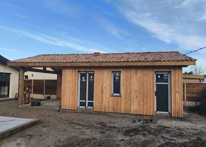 Création d'une extension en bois de 60m2 avec charpente bois couverture tuiles et menuiserie en aluminium 2