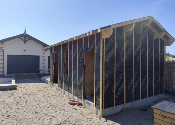 Création d'une extension en bois de 60m2 avec charpente bois couverture tuiles et menuiserie en aluminium 8