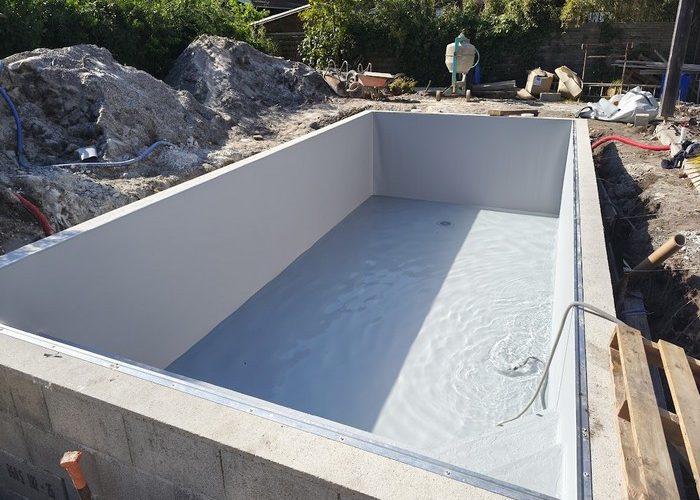 Création piscine traditionnelle maçonnée de 7.5 x 3.5 membrane armée à Andernos les bains 13