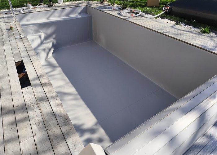 Pose membrane armée Delifol piscine de 7.5 x 3.5 à Andernos les bains
