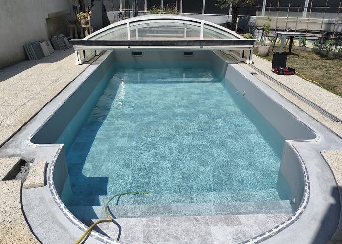 Pose membrane armée piscine de 8m x 4m avec escalier roman à Lège Cap Ferret 4