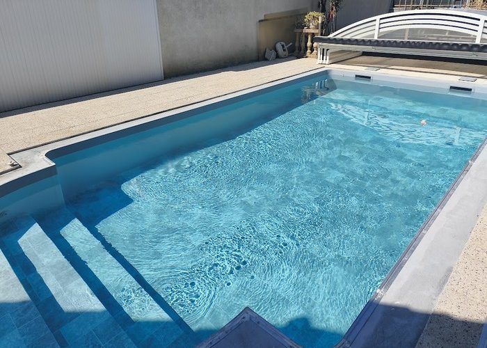 Pose membrane armée piscine de 8m x 4m avec escalier roman à Lège Cap Ferret 6